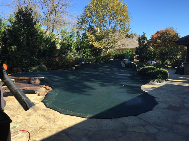 Pool Leaf Cover with Rock Wall